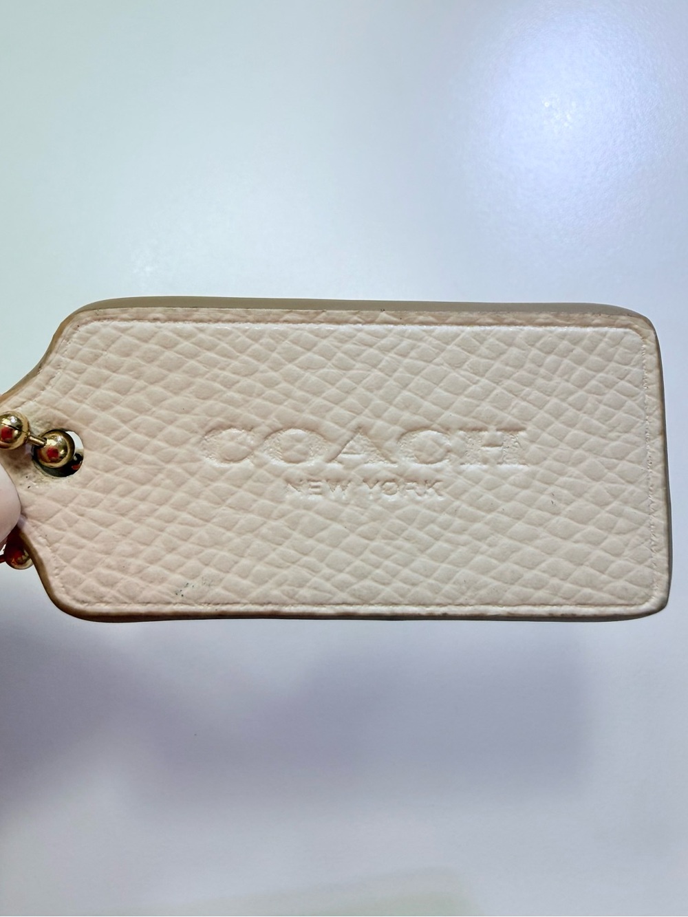 Coach Cream Bag Tag